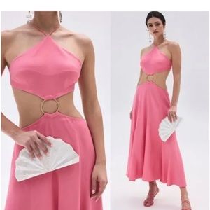 The Nadeesha midi dress from Cult Gaia in a bright and feminine pink.